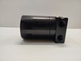 a close up of a black object on a white surface