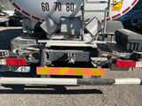 a truck with a tank on the back of it