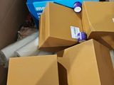 many boxes that are sitting in a box on the floor