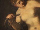 a painting of a nude woman holding a snake in her hand