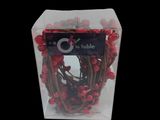a clear box with a bunch of red berries inside of it