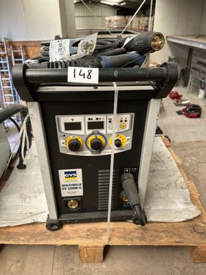 a machine that is sitting on a pallet in a warehouse