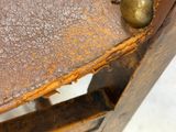 a close up of a piece of metal with rust on it