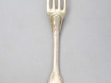 a fork that is sitting on a table