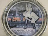 a clock that has a picture of a woman on it