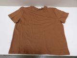 an image of a brown shirt sitting on top of a white table