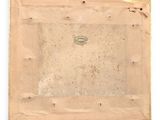 an old picture of a piece of paper with a hole in it
