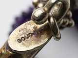 a close up of a metal object with a tag on it