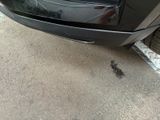 a close up of a car ' s front bumper
