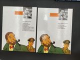 two cards with a picture of a man smoking a pipe