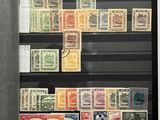 a picture of a collection of stamps in a display case