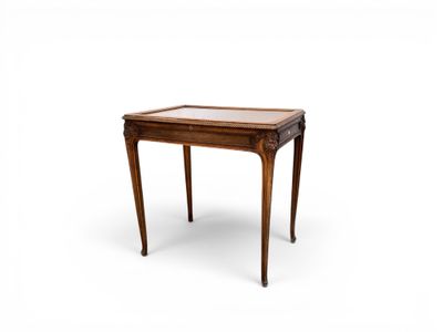 a small wooden table with a glass top on a white background