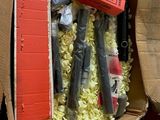 a cardboard box with a bunch of tools inside of it