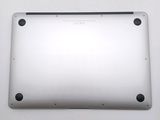 the back of a white tablet computer sitting on top of a white table