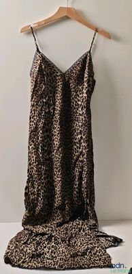 leopard print slip on a hanger next to a leopard print slip on a hanger