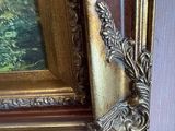 a picture of a painting hanging on a wall