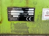a close up of a green machine with a sticker on it ' s side