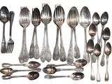 a lot of spoons and spoon spoons on the table