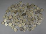 a lot of coins that are on the table