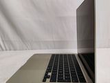 a laptop computer sitting on top of a white table