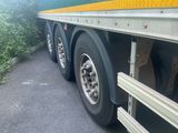 a truck that is parked on the side of the road