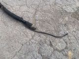 a black cord that is laying on the ground