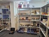 a room with a lot of shelves and shelves filled with items