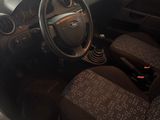 a car that has a steering wheel and some seats in it