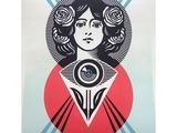 a poster of a woman with an eye in her hair