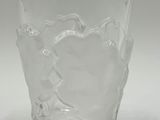 clear glass with a design of a horse and rider on it