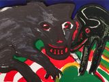 un tableau représentant un chat noir allongé sur une couverture rouge et verte