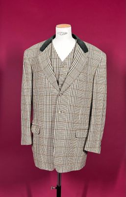 an image of a suit on a mannequin stand