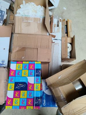 a pile of boxes that are sitting on the floor