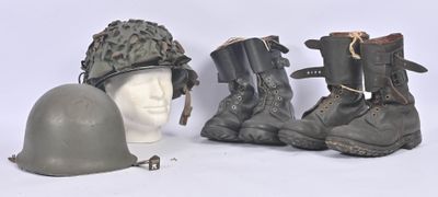 three helmets and a helmet are sitting on a mannequin head