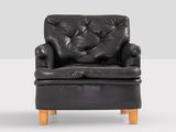 pair of black leather armchairs with wooden legs