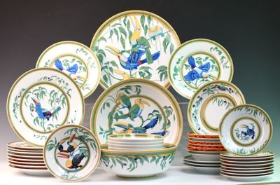 a lot of plates that are sitting on a table