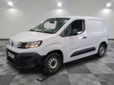 a picture of a white van parked on a checkered floor