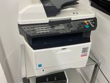 a printer that is sitting on top of a table