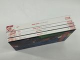 three books are stacked on top of each other on a table