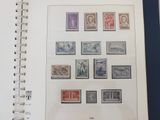 a picture of a book with a lot of stamps on it