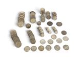 a lot of coins that are on the table