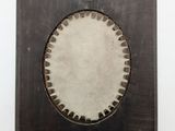 a picture of a clock that is on the wall