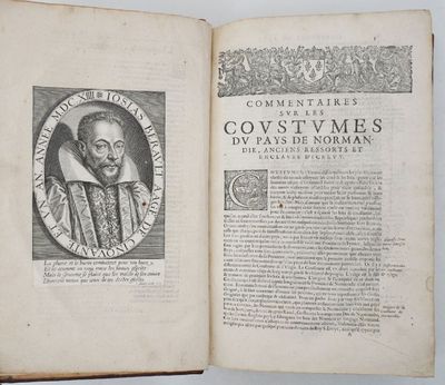 un vieux livre sur lequel figure l'image d'un homme portant une couronne