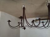 a chandelier hanging from the ceiling in a room