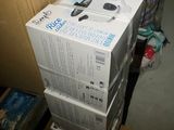 boxes stacked on top of each other on the floor in a room