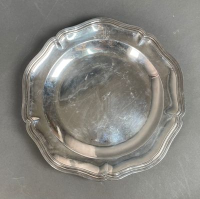 a silver plate that is sitting on a table