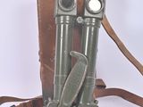 a brown bag with two binoculars on it and a brown strap