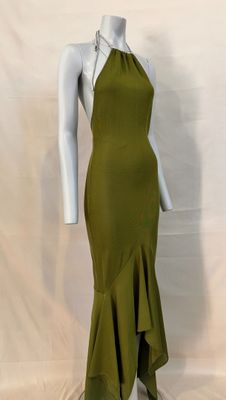 the mannequin is wearing a green dress on a white mannequin mannequin