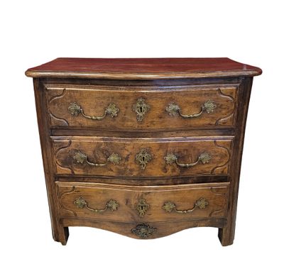 an antique chest of drawers with a wooden top and brass hardware