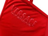 a close up of a red bikini top with the word versa on it